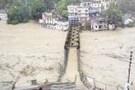 India flood news, Uncontrolled rains in North India, impassioned rains killed at least 120 in n india, Hindu religious sites