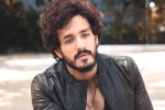 Nagarjuna and Akhil film news, Nagarjuna, nagarjuna s 100th film will have akhil in a crucial role, Akhil movie